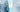 Tube of Sachajuan Ocean Mist Texturizing Hair Cream floating in blue water