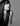 Black and white photo of model with long black hair