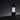 Bottle of Sachajuan Protective Hair Perfume Bois Noir on black platform
